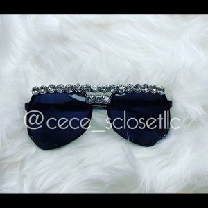 Black shades with diamond jeweled trim.